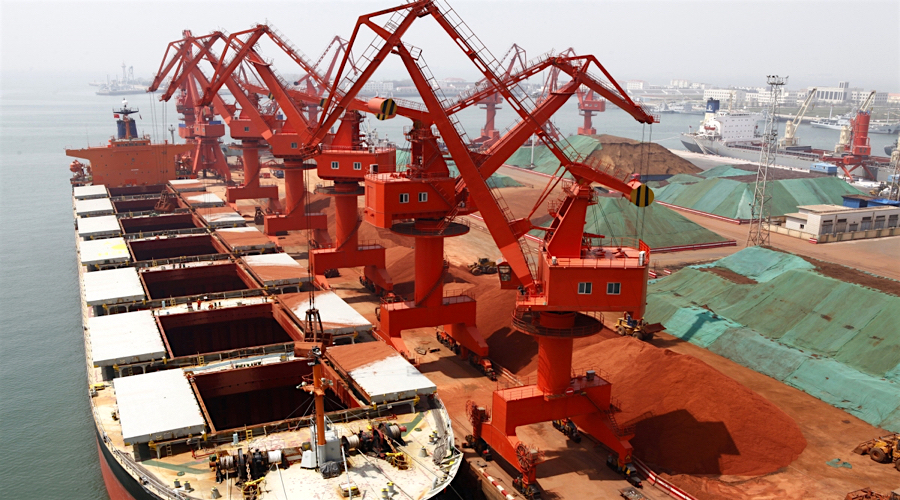 China imported record iron ore in September as steel output curbs start to bite