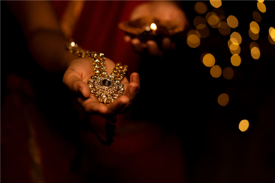 Asia Gold-Indian demand lights up on Dhanteras, Diwali